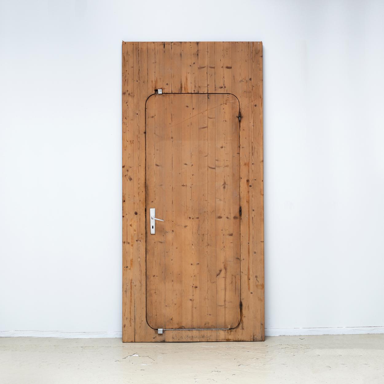Huge Pine Door from AAM – atelier architecture en montagne –